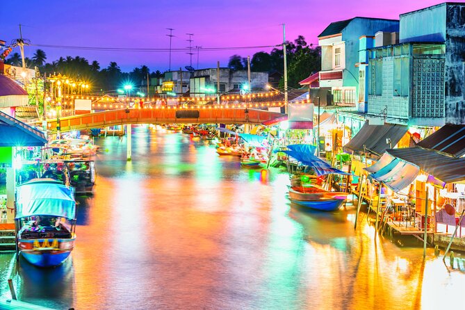 Amphawa Boat Ride & Railway Market: Multi-Lang Private Tour - Wat Bang Kung’s banyan roots: a temple shaped by nature