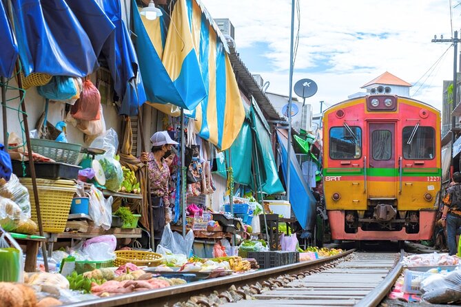 Amphawa Floating Market & Maeklong Railway Train Market Tour - Maeklong Railway Market: where the train owns the aisle