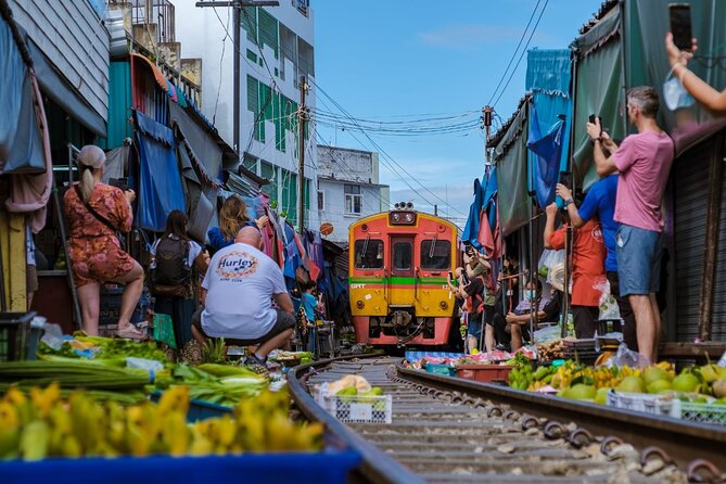 Amphawa Floating Market & Maeklong Railway Train Market Tour - Amphawa Floating Market: canal-side “water market” snacks, not boat hopping