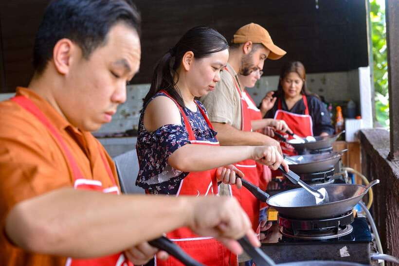 Ao Nang: Half-Day Thai Cooking Class Krabi Province - The open-air hillside kitchen, views, and a temple beside the class