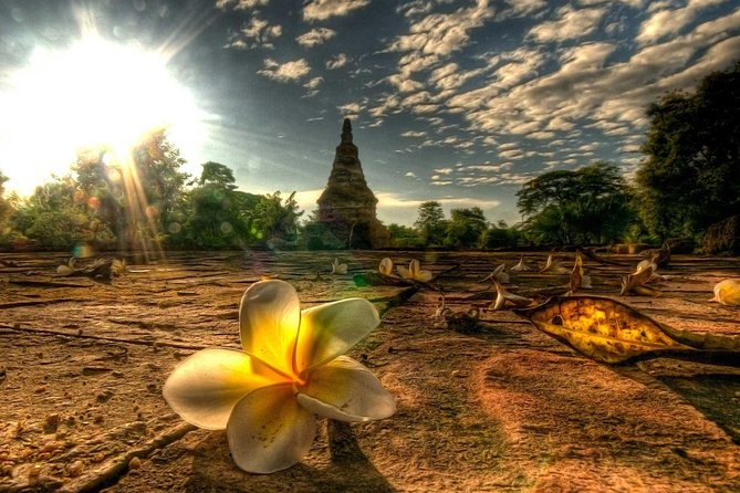Ayutthaya Ancient City - Wat Yai Chai Mongkol: soaring stupa views and rows of seated Buddhas