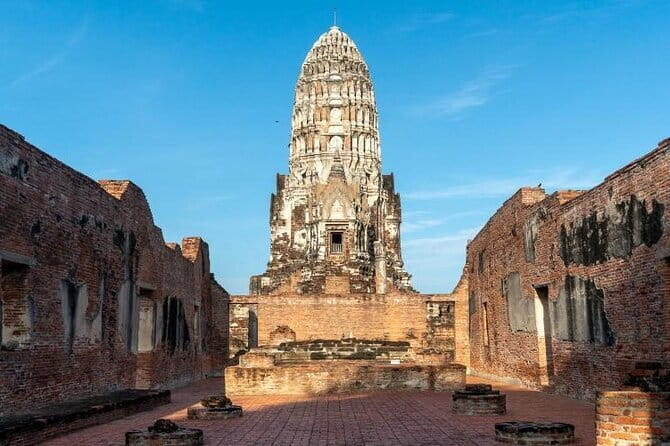Ayutthaya Bicycle Tour with Scenic Boat Experience - Wat Mahathat: The Banyan-Root Buddha Moment