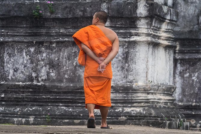 Ayutthaya Temples and River Cruise from Bangkok - Wihan Phra Mongkhon Bophit: the huge seated Buddha, inside its structure