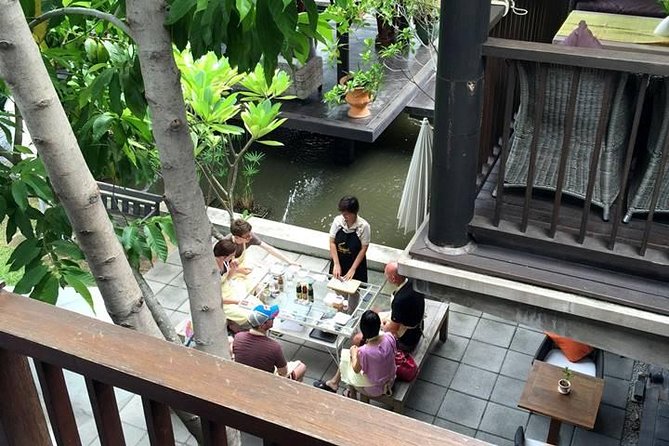 Baipai Thai Cooking School Class in Bangkok - The School Setting: A Calm Oasis, Garden Herbs, and Open-Air Cooking