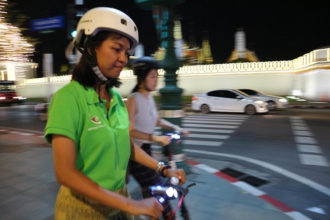 Bangkok at Night by Electric Scooter - Wat Phra Chetuphon, Wat Pho, and temple time that actually fits the night