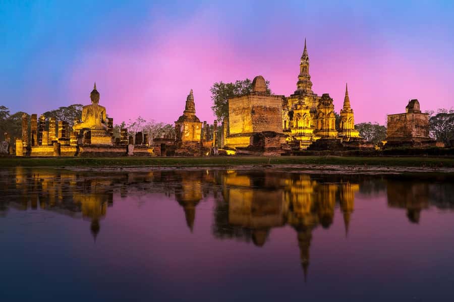 Bangkok: Ayutthaya & Local Market Tour In Spanish or English - Wat Yai Chai Mongkol: Stupa Views, Reclining Buddha, and Monk Rows
