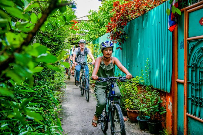 Bangkok: Backstreets and Temple Historic Bike Tour - Khaosan Road and Phra Athit Road, leaving backpacker Bangkok quickly