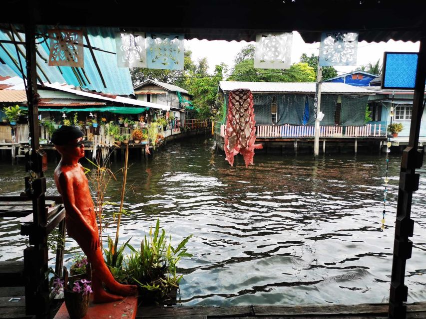 Bangkok: Canal Boat Tour, Big Buddha & Artist's House - Baan Silapin (Artist’s House): art, old wood, and fish from the porch