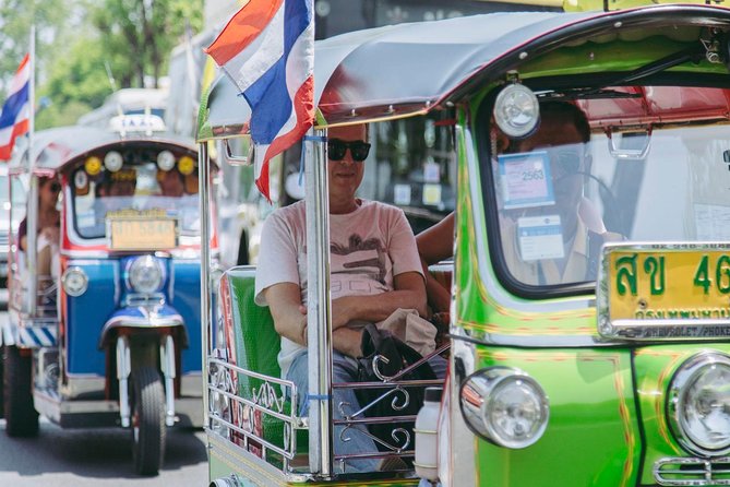 Bangkok Electric Tuk Tuk: Thonburi, Wang Lang & Food Tour - Riding the Chao Phraya Express Boat, then ending at Pak Khlong Talat