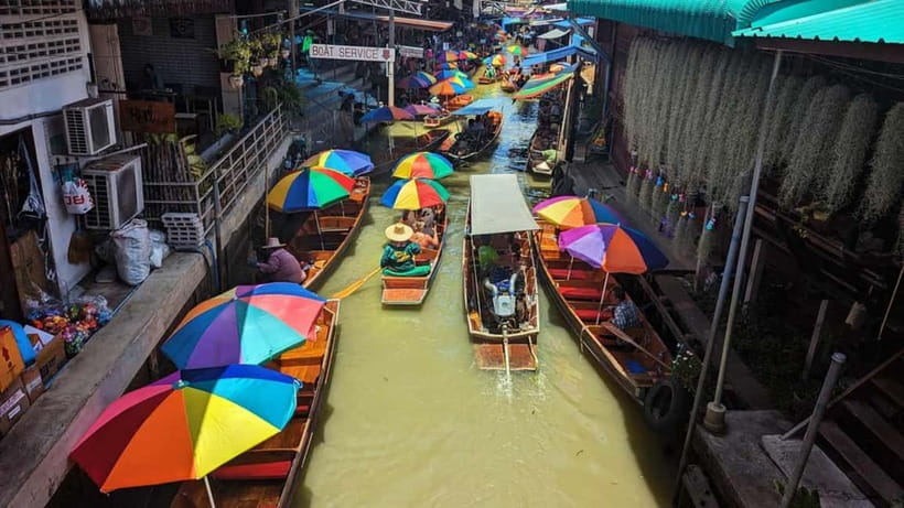 Bangkok: Floating Market & Railway Market with Hotel Pick Up - Maeklong Railway Market: Umbrellas Up, Cameras Ready