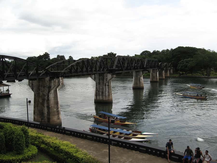 Bangkok: Kanchanaburi and Erawan Waterfall Private Tour - The River Kwai bridge, why waiting for the train is part of the magic