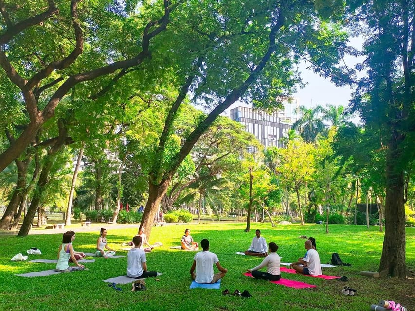 Bangkok: Lumpini Park Yoga Experience - Meeting at Namaste All! Near the King Statue