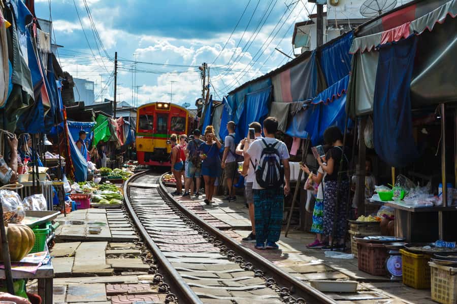 Bangkok: Maeklong Train Market & Floating Market Day Tour - Getting Oriented at Golden Place Near Tha Chang Pier