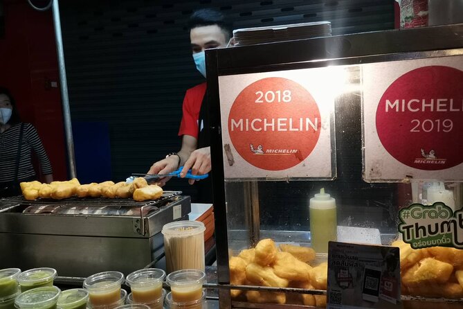 Bangkok: Michelin Guide Street Food Tour by Tuk Tuk - Rajadamnoen Avenue sights, a quick palace-to-palace connection