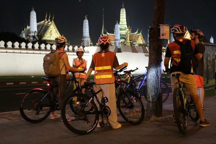 Bangkok: Night Bike Ride and Dinner at a Local Restaurant - Night cycling in Bangkok feels cooler, calmer, and more real
