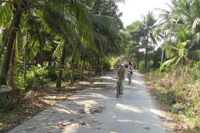 Bangkok Tour by Boat and Bike - Cycling through temples, villages, and markets (and that short bridge pause)