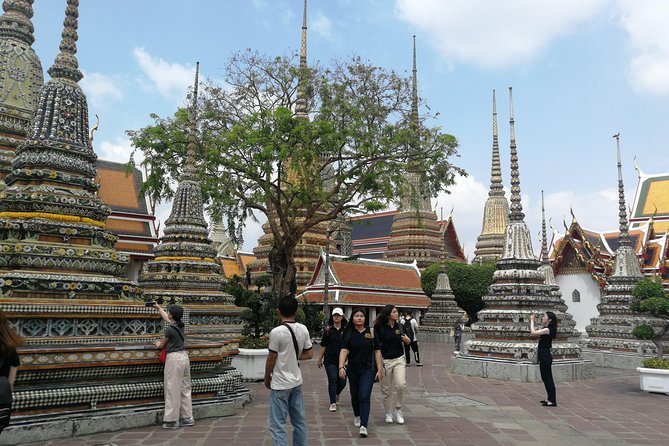 Bangkok Tour: Highlights & Hidden Gems & Long Tail Boat - Stop 4: Wat Pho (Wat Phra Chetuphon), the Reclining Buddha Complex