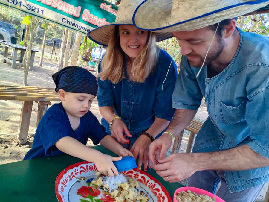 Chiang Mai: Elephant Sanctuary Guided Tour in Spanish - Caretaker Clothes, Sanctuary Intro, and Preparing Elephant Breakfast