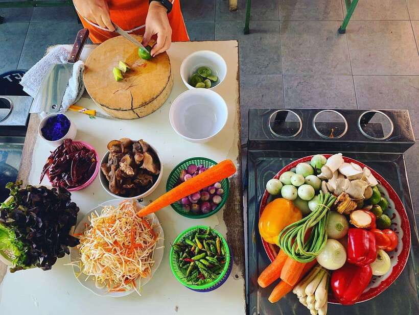 Chiang Mai: Half Day Cooking Class at Organic Farm - Your dishes at the table: eating traditional Thai style in the garden