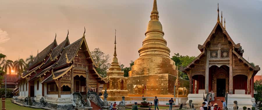 Chiang Mai Light: Tuk Tuk Night Tour with Temples & Markets - Tha Phae Gate: a key night landmark for orientation