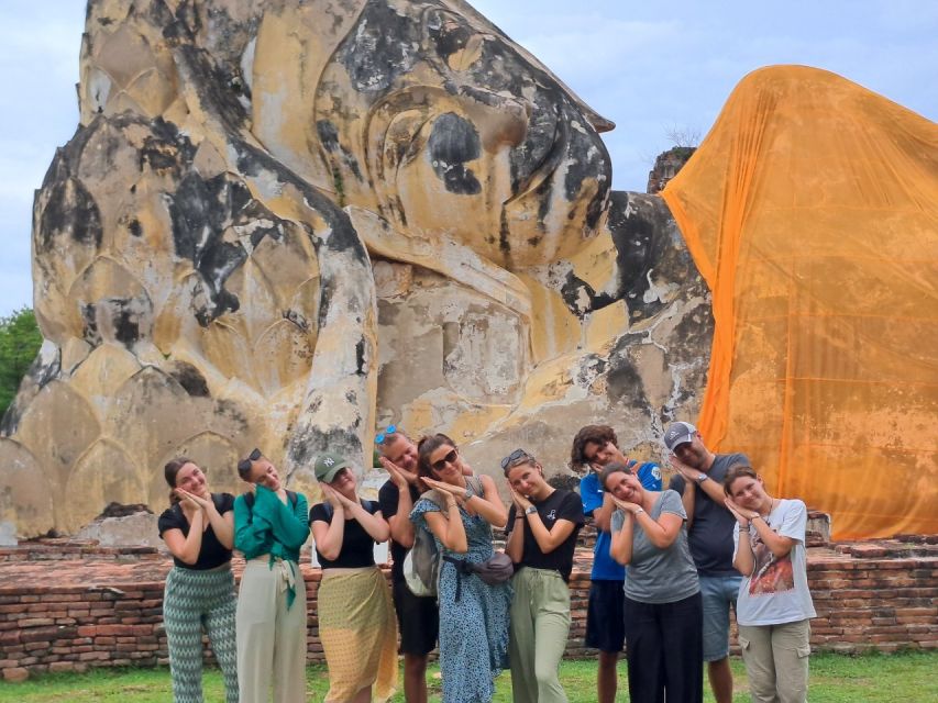 Colors of Ayutthaya: UNESCO Heritage 6 hour Bicycle Tour - Wat Mahathat: the Buddha head in tree roots