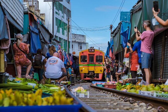 Damnoen Saduak Floating Market and Maeklong Railway Market Tour - Damnoen Saduak Floating Market: canals, crowds, and where the boat ride earns its keep