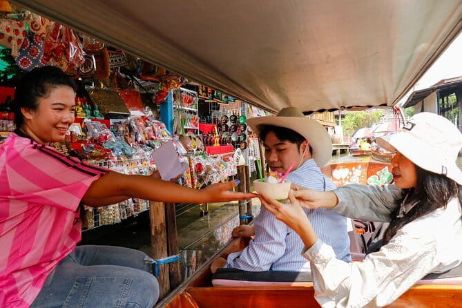 Day Trip to Bangkok Floating Market & Maeklong Railway - Damnoen Saduak Floating Market, the long-tail boat part is half the fun