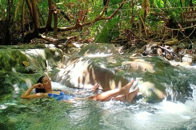 Discover Krabi - Emerald Pool, Hot Springs & Tiger Cave Temple - Stop 2: Namtok Ron hot spring waterfalls in the shade