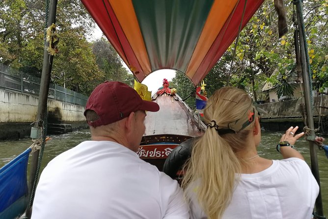 Explore Bangkok by Bike & Boat with Lunch - Long-tail speedboat ride back: canals, villagers, and lizard odds