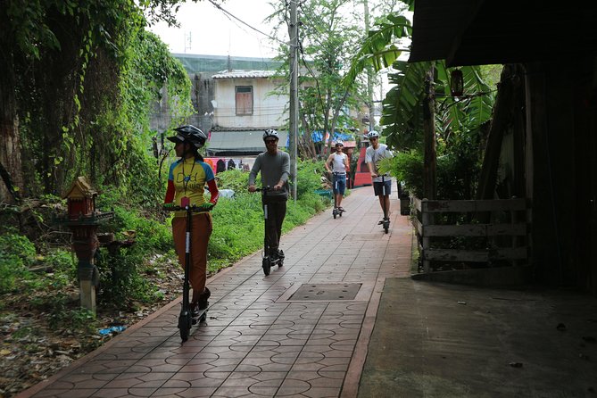 Explore Bangkok by E-Scooter & Try Street Food - Flute Makers Village, quick snacks, and the temple that sets the tone