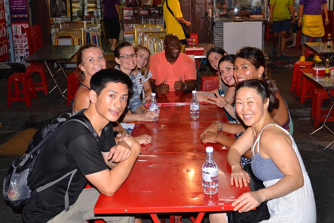 Flavors of Bangkok: Small-Group Chinatown Evening Food Tour - Stop One Through Chinatown Streets: First Bites and a Big Landmark