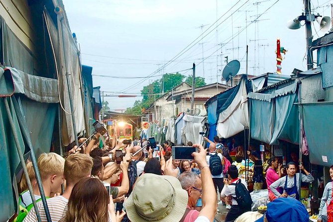 Floating and Railway Market (Optional Waterfall): Private Tour - Maeklong Railway Market: watching goods move as the train arrives