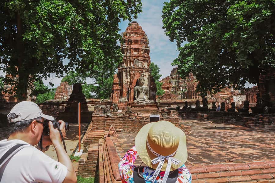 From Bangkok: Ayutthaya Day Tour by Bus with River Cruise - How the Day Flows: Early pickup, temple circuit, river return