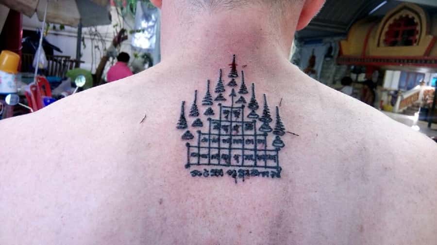 From Bangkok: Holy Tattoo Experience at Wat Bang Phra - Temple time, fish feeding, and what you can realistically fit in