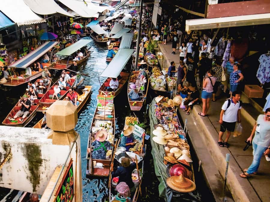 From Bangkok: Maeklong Railway and Floating Market Day Tour - Maeklong Railway Market: the move-and-wait spectacle on active tracks