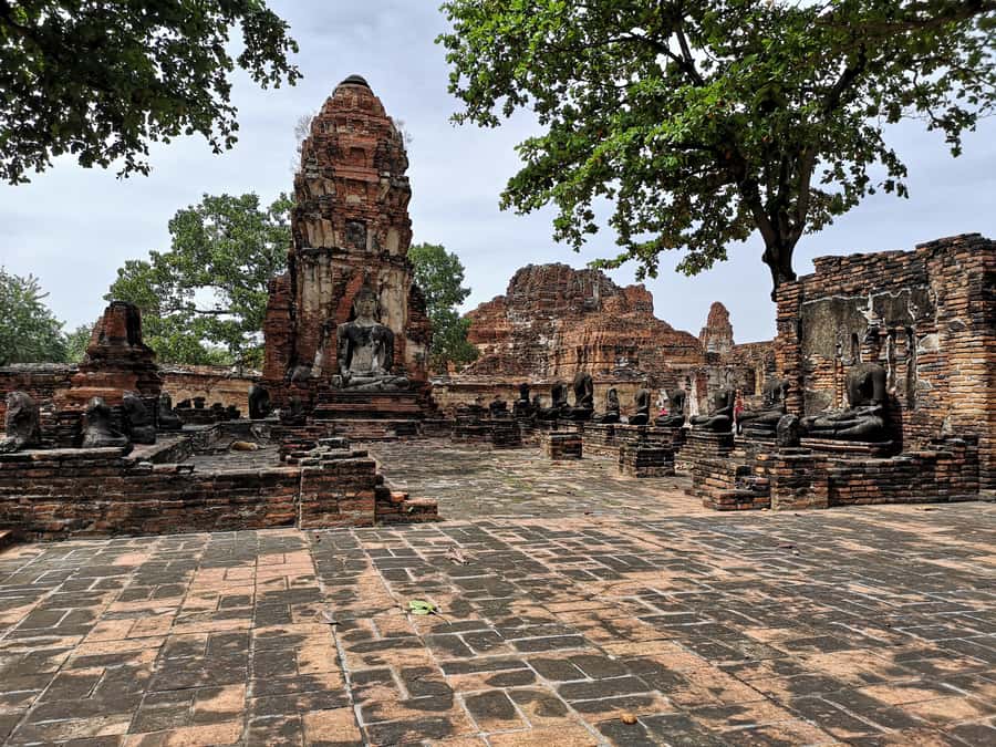 From Bangkok: Private Tour to Ayutthaya & Summer Palace - Wat Lokayasutharam: reclining Buddha scale and calm
