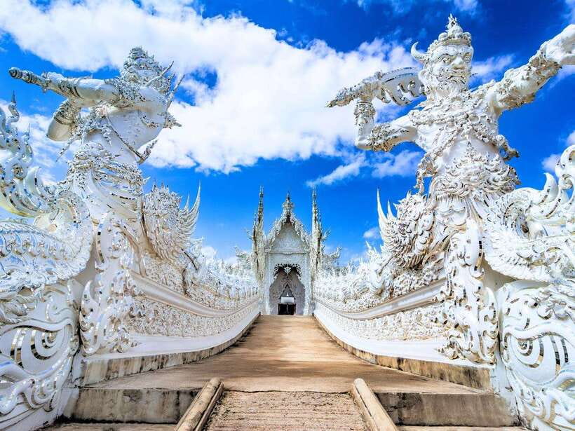 From Chiang Mai: Chiang Rai Famous Temples Guided Tour - Wat Rong Khun, The White Temple: What to Look For Beyond the Color