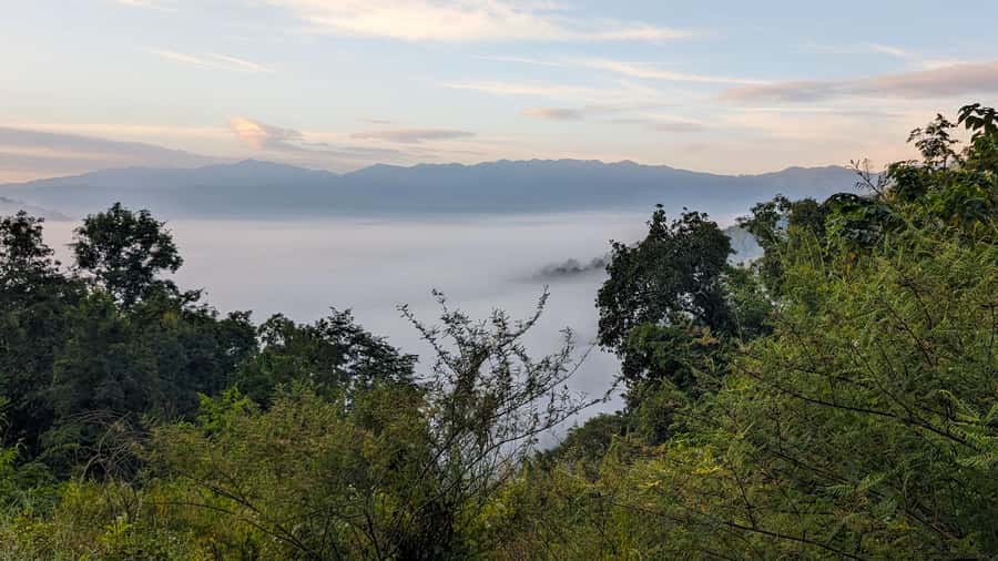 From Chiang Mai: Day Tour to Pai Highlights by Private Car - Wat Phrathat Mae Yen: 300 steps, big Buddha, and temple etiquette