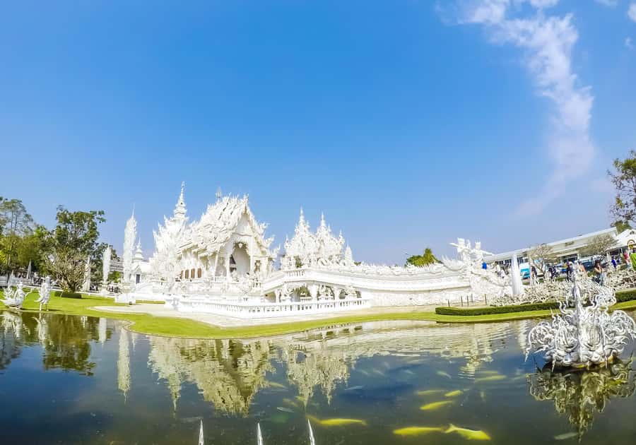 From Chiang Mai: White Temple & Golden Triangle Day Trip - Wat Rong Khun White Temple: mirror magic, guided meaning, and crowd management