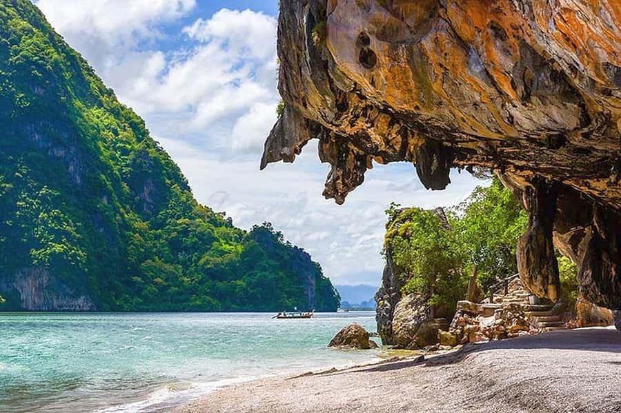 From Khao Lak: Premium James Bond Sunset and Canoe Adventure - Koh Panack: mangroves, cave corridors, and a Jurassic-style lagoon
