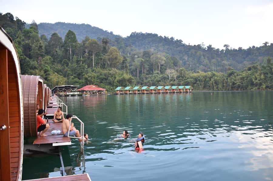 From Krabi: Cheow Lan Lake Cruise and Khao Sok Jungle Hike - Praiwan Raft House lunch on the lake, then swim and kayak