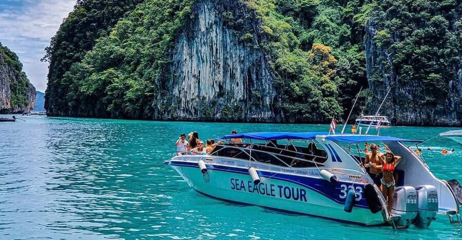 From Krabi: Phi Phi Islands Speedboat Day Tour - Pileh Lagoon snorkeling: where the water looks like an aquarium