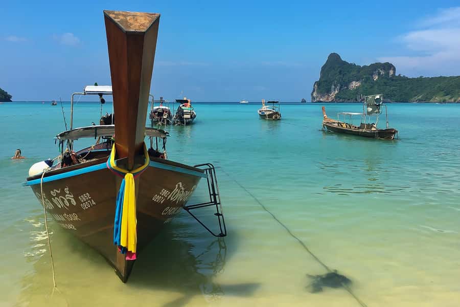 From Phuket Or Khao Lak: Phi Phi Islands Early Bird Tour - Pileh Lagoon swim break: where the day slows down