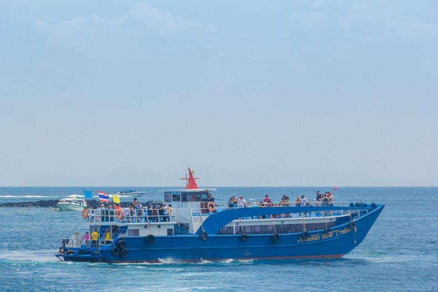 From Phuket: Snorkeling Ferry Cruise to Phi Phi Islands - Pileh Cove Lagoon and Limestone-Wall Views