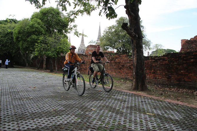 Half-Day Ayutthaya City Cultural Bike Tour - Wat Lokayasutharam: Massiveness and Restored Floor Tiles