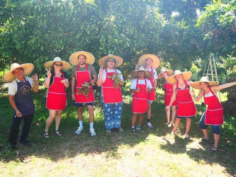 Half-Day Thai Cooking Class on a Local Farm Near Chiang Mai - Walking the herb garden on an organic farm