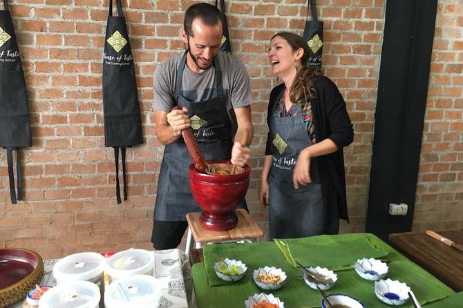 Hands on Thai Cooking Class and Market Tour - Picking the right departure: Asok Market versus mango carving
