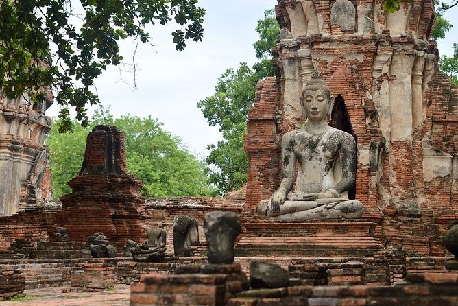 Historical City of Ayutthaya - Unesco Full Day Tour From Bangkok - Stop 3: Wat Mahathat And The Meaning Behind The Great Relic