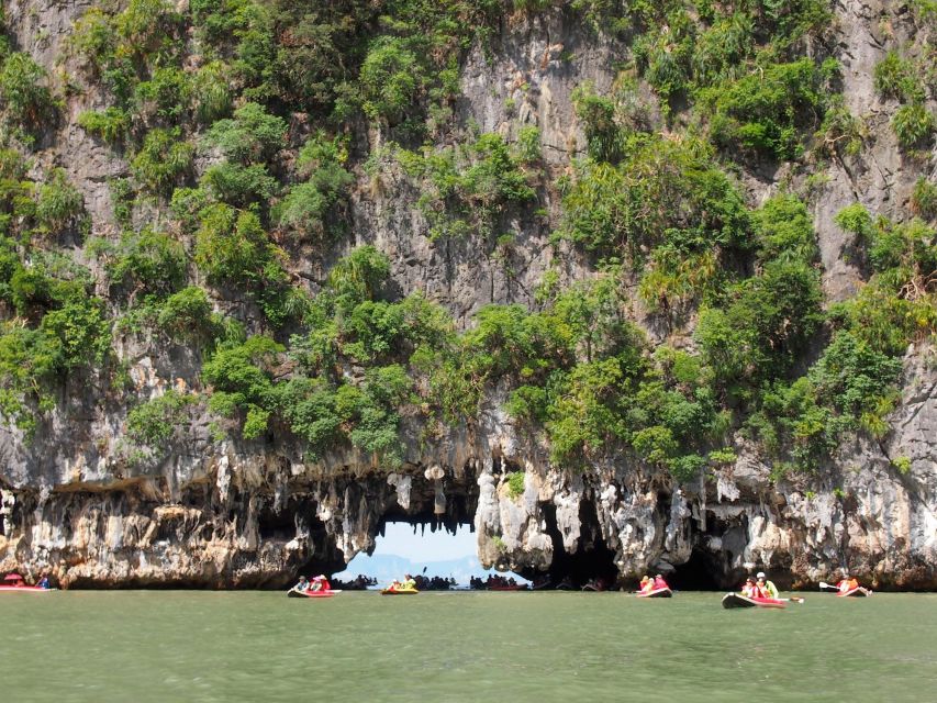 James Bond Island: Sightseeing Tour by Longtail Boat & Kayak - Koh Panyee floating village lunch: good food, quick wandering, and souvenir reality