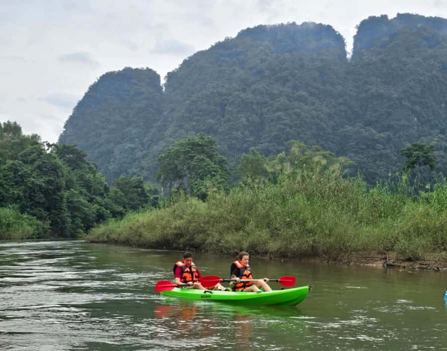 Khao Sok Park: Jungle Kayak Adventure & Wildlife Tour - Wat Tham Pla Fish Cave: Giant Carp, Cave Temple Calm